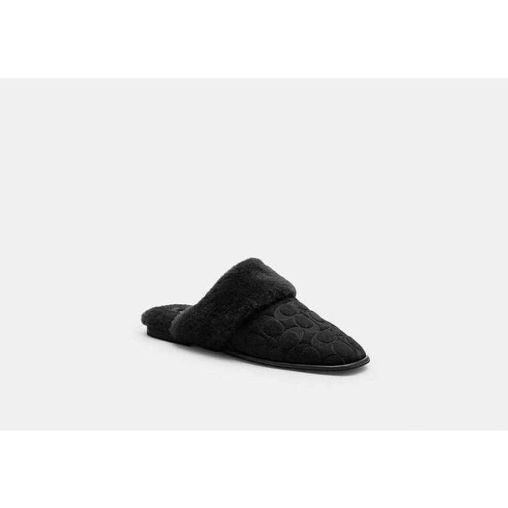 Sherpa Flat Mule In Signature Suede